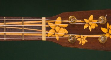 Custom pony banjo with daffodil inlay