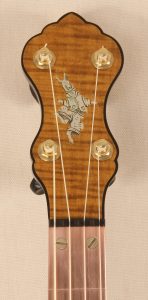 Custom banjo with had engraved B'rer Rabbit peghead inlay